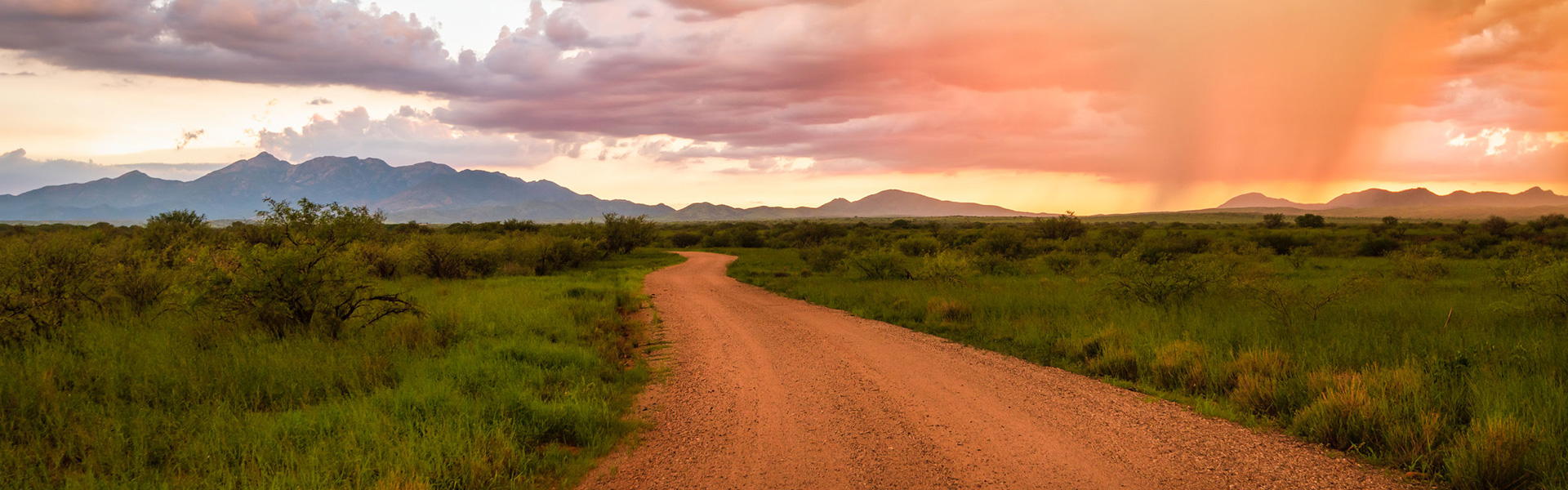 Vibrant sunset in Sonoita Arizona, road leading into the distance