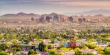 Downtown Phoenix skyline in background with housing near downtown Phoenix in the foreground