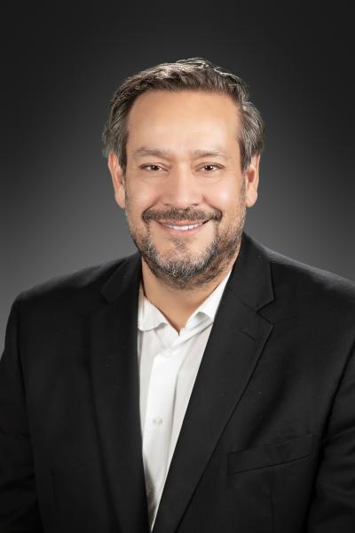 Portrait of Carlos Contreras, Director of OEO