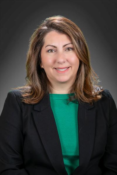 Portrait of Gina Flores, Deputy Director of OEO