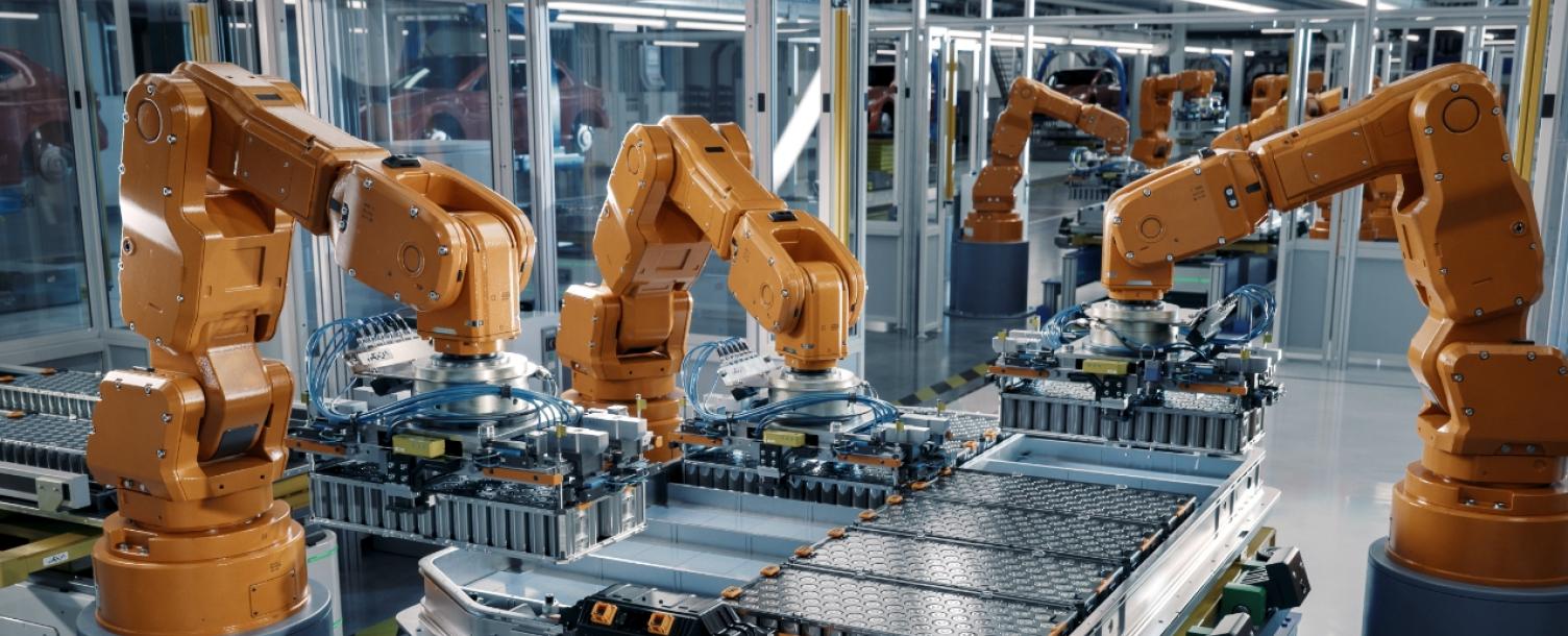 Image of robots building parts